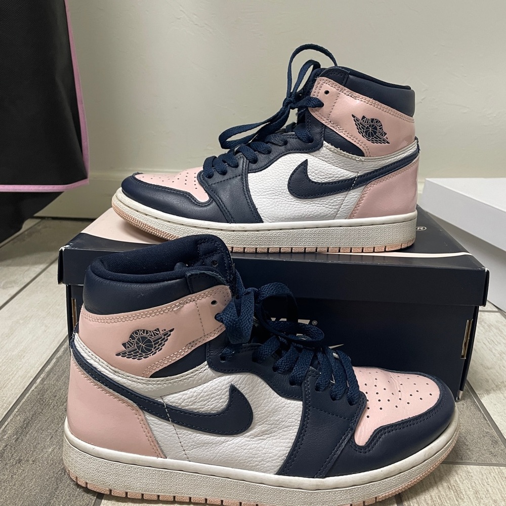 Nike Air Jordan Retro Pink and Navy Sneakers atmosphere